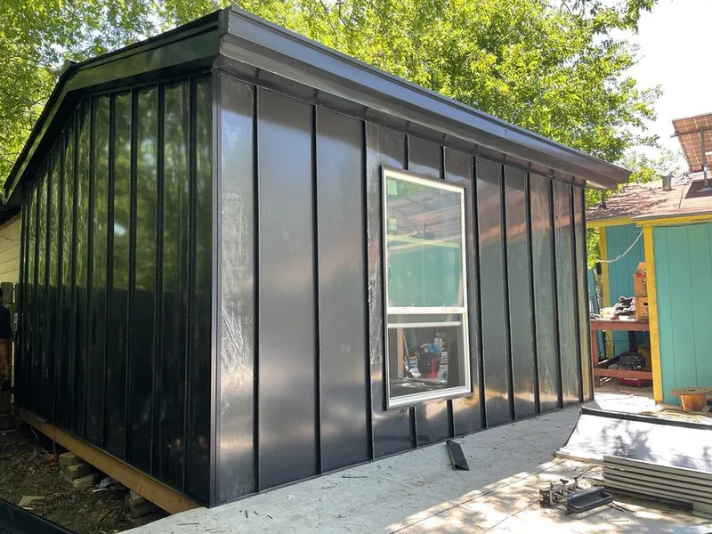 Black standing seam metal wall panels for Roof Inspection in Plainfield